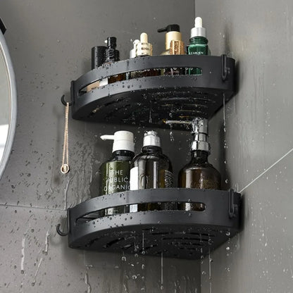 Adhesive shower shelf installed on tile wall holding shampoo 