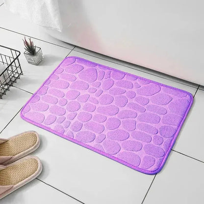 anti slip bath mat placed near shower for safe stepping surface